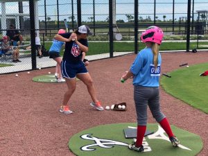Batting practice at American Girls Baseball camp.