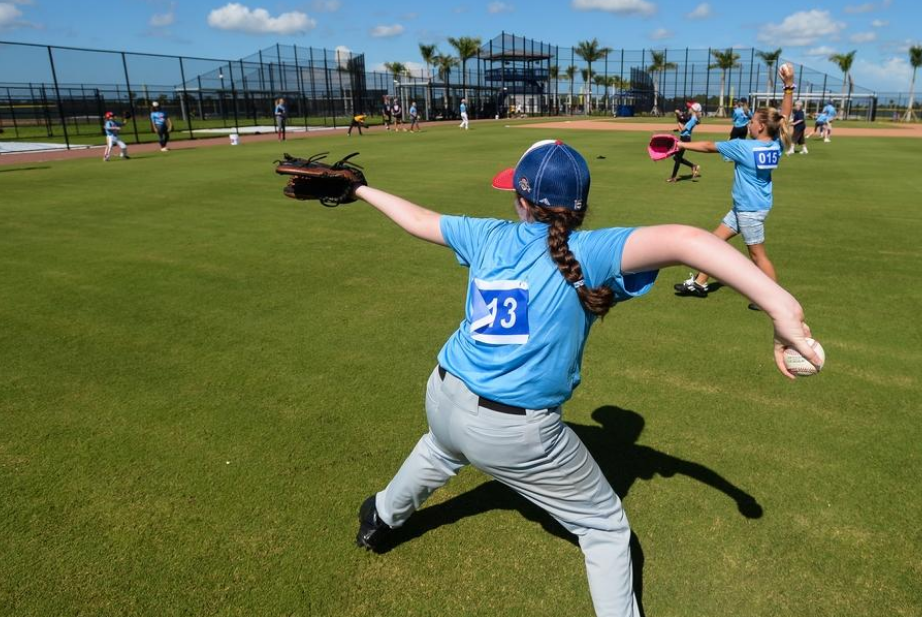 Meredith Kenny, 11, of Palm Beach Gardens throws during camp at Cool Today Park in North Port on Friday. [HERALD-TRIBUNE STAFF PHOTO / DAN WAGNER]